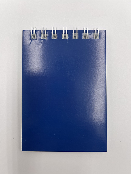 Блокнот А7 (68 х 99 мм) 32л.кл.на гребне Синяя,обл.дизайнерский картон,блок офсет