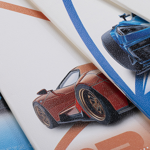 Тетрадь 18 листов в линию "Момент скорости" А5ф 60-65г/кв.м на скобе Обл. мел.картон тиснение 5 диз.в блоке скругл.углы